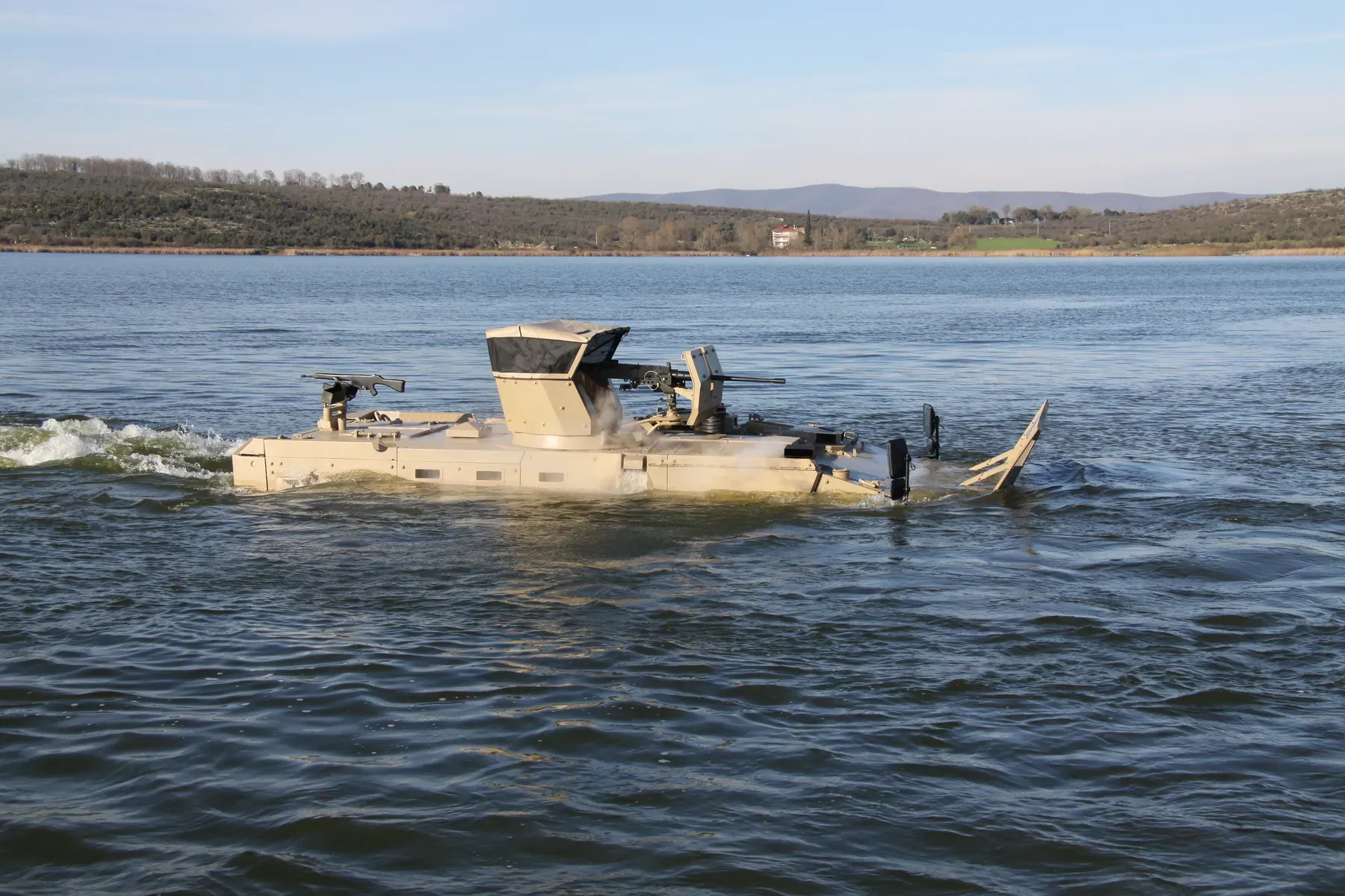 Amphibious TAIMAS 6×6 crossing a lake